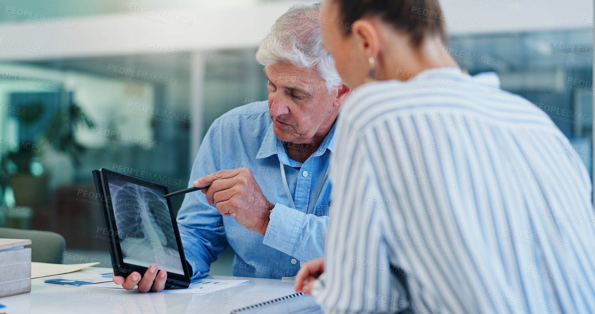 Buy stock photo Doctor, team and x ray on tablet for healthcare, discussion and planning surgery for heart operation. Man cardiologist, woman or tech screen in hospital for diagnosis, medical report and review image