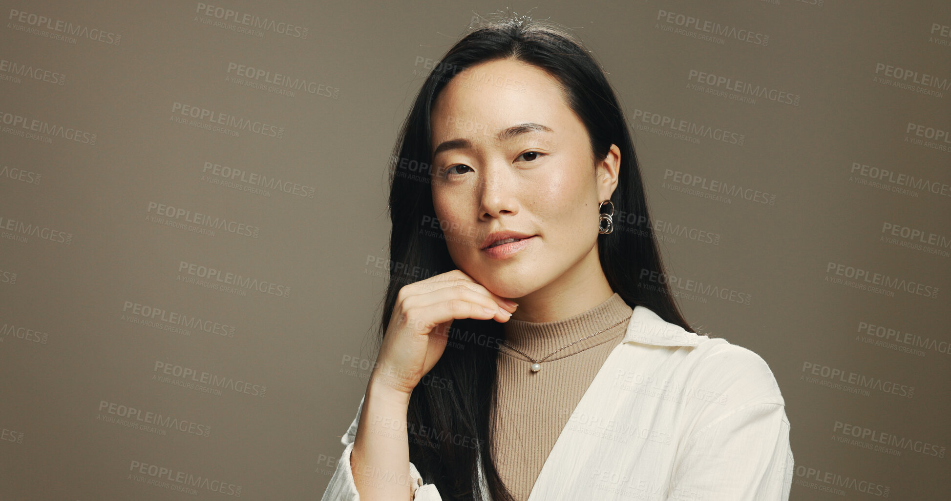 Buy stock photo Beauty, studio and portrait of Asian woman for wellness, skincare and facial treatment. Mockup space, spa and face of person with natural skin for cosmetics, salon and shine on brown background