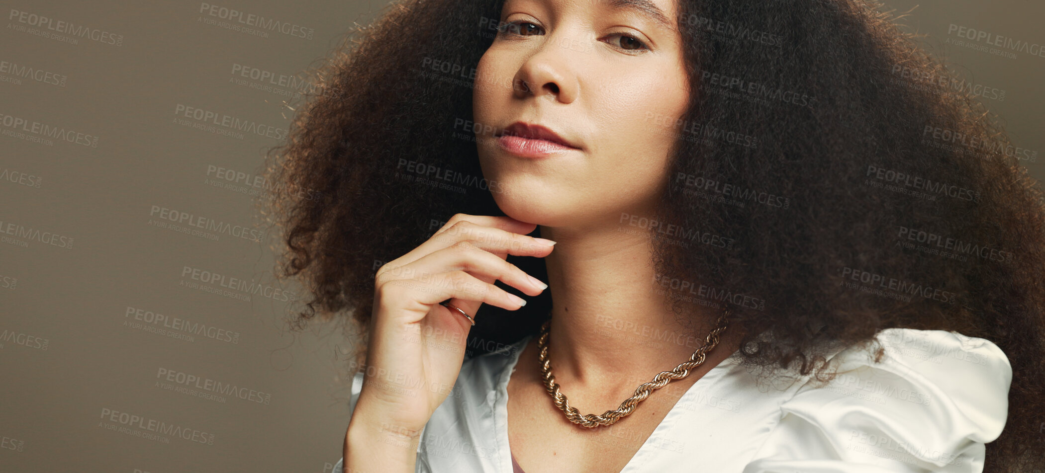 Buy stock photo Beauty, studio and portrait of African woman for wellness, texture and treatment on brown background. Hairdresser, mockup space and face of person with natural hair for cosmetics, growth and salon