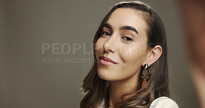 Buy stock photo Woman, portrait and selfie in studio with makeup, natural beauty or smile. Influencer, confident or POV on gray background space for photography, social media engagement or cosmetics tutorial results