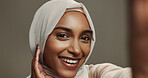 Studio, selfie and woman with smile, hijab and confidence for social media, live streaming or profile picture. Photography, portrait and face of muslim girl on grey background for happy Ramadan
