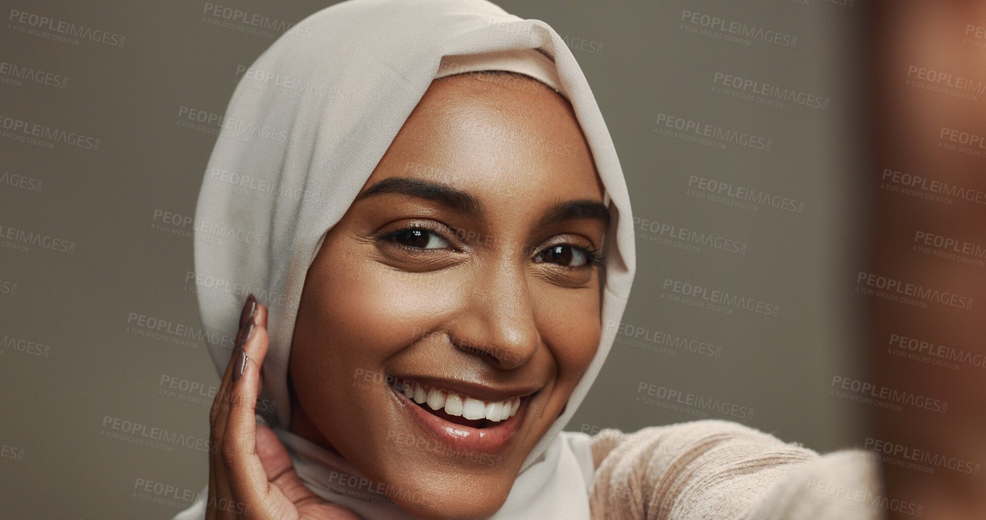 Buy stock photo Studio, selfie and woman with smile, hijab and confidence for social media, live streaming or profile picture. Photography, portrait and face of muslim girl on grey background for happy Ramadan