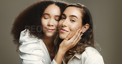 Buy stock photo Women, friends and hug with beauty in studio for cosmetics, makeover and facial treatment. People, embrace and natural skin with inclusion, dermatology glow and glamour aesthetic on brown background