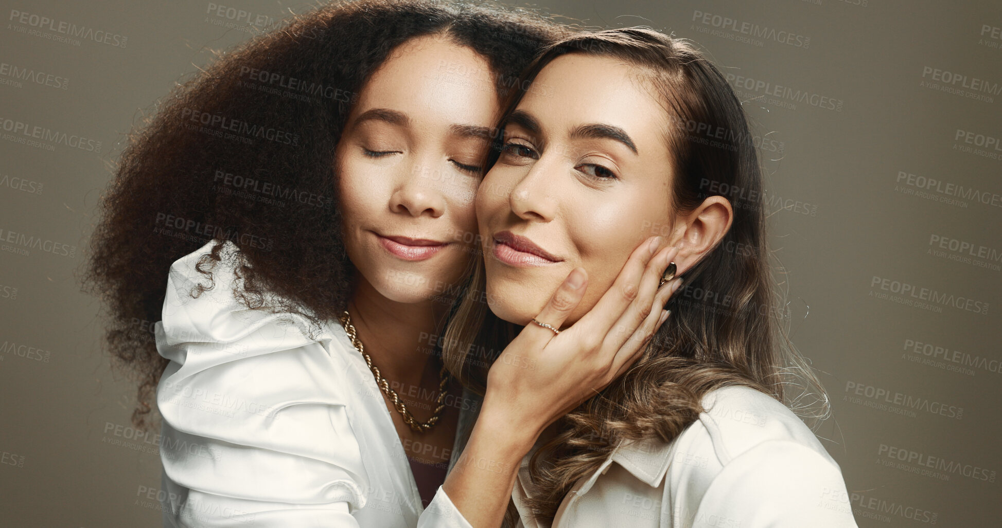 Buy stock photo Women, friends and hug with beauty in studio for cosmetics, makeover and facial treatment. People, embrace and natural skin with inclusion, dermatology glow and glamour aesthetic on brown background