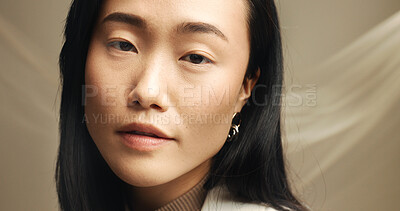 Buy stock photo Beauty, cosmetics and portrait of Asian woman in studio for skincare, treatment or wellness. Collagen, dermatology and makeup with confident model on fabric backdrop for aesthetic transformation