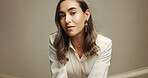 Confident, beauty and woman with makeup, studio and self expression with cosmetics, model and aesthetic. Space, portrait and person with foundation for appearance, glow and proud of color on face