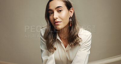 Buy stock photo Confident, beauty and woman with makeup, glow and self expression with cosmetics, model and portrait. Studio background, calm and person with shine of foundation, space and appearance with treatment