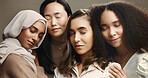 Beauty, friends and face of women in studio for skincare, cosmetics and makeup. Eyes closed, brown background and people with natural skin for inclusion, support and glow for facial treatment