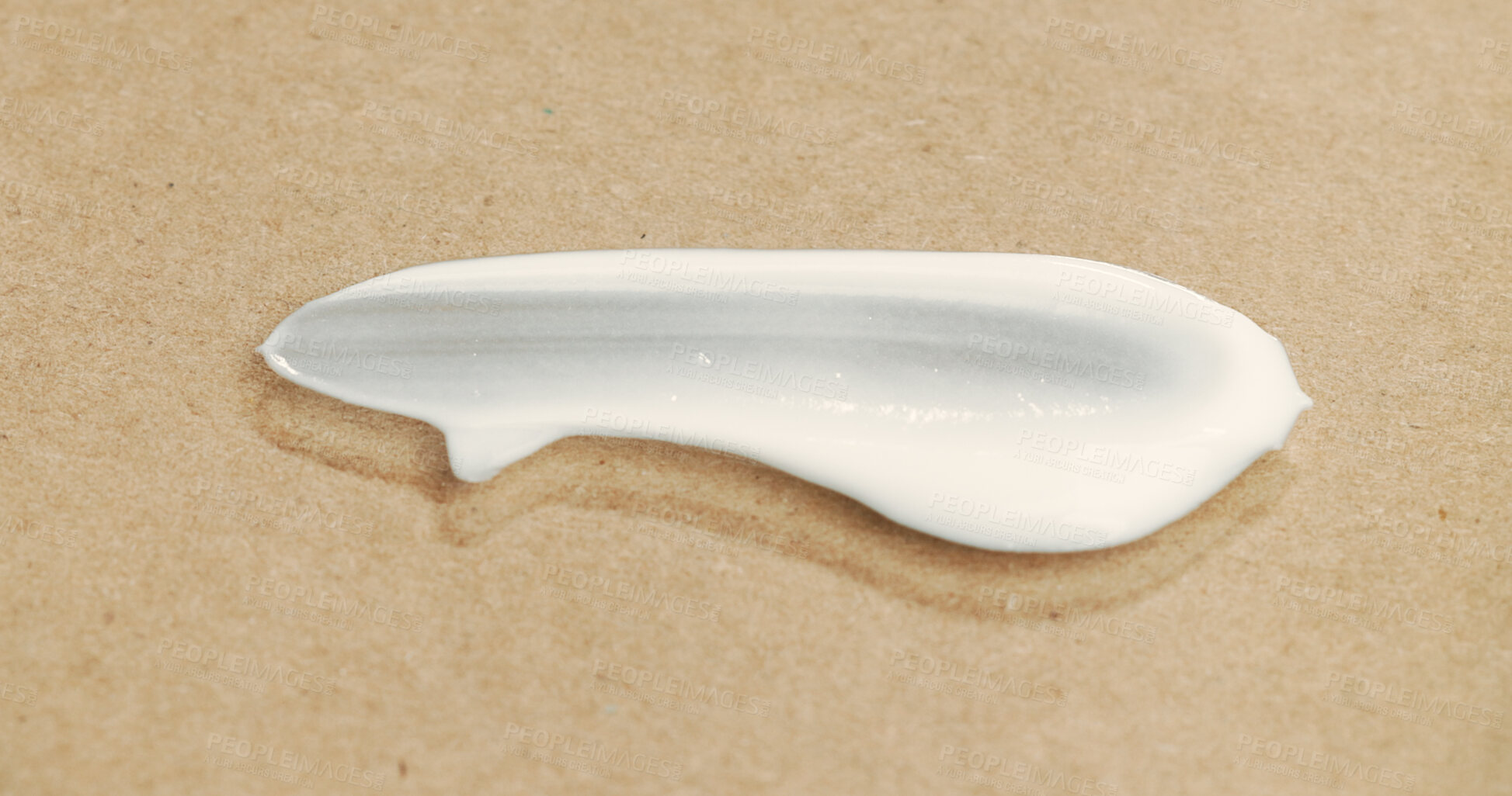 Buy stock photo Skincare, cosmetic and smear of lotion in studio for moisturizing, hydration or cream for treatment. Dermatology, beauty or skin routine with spf, creme or sunscreen for wellness by brown background.