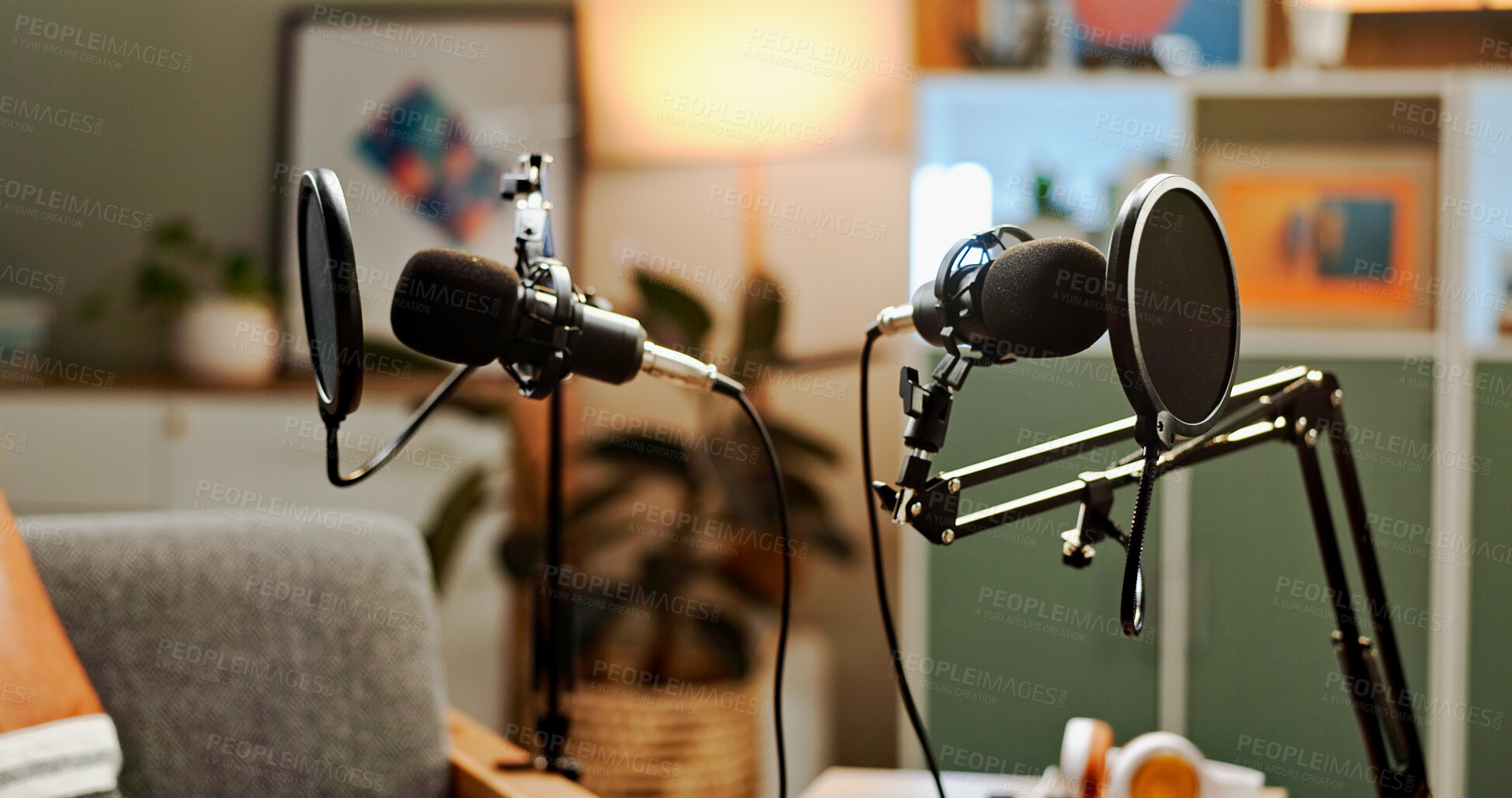 Buy stock photo Microphone, podcast and recording for live streaming in studio, broadcast and announcement. Equipment, empty room and social media talk show with radio service, streamer setup and entertainment audio