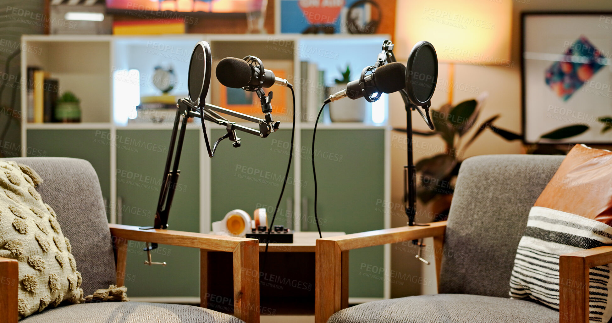 Buy stock photo Microphone, podcast and setup for live streaming in studio, broadcast and announcement. Equipment, empty room and recording for talk show with radio service, streamer session and entertainment audio
