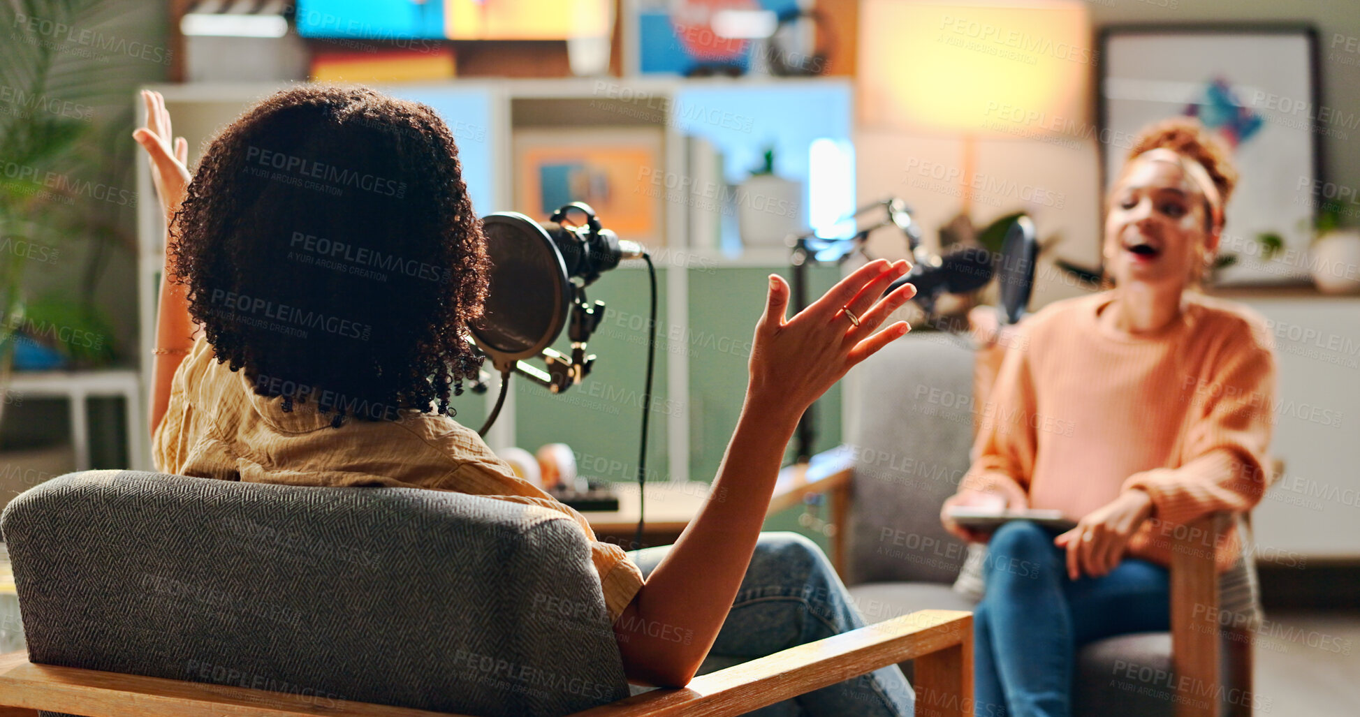 Buy stock photo Women, tablet and happy for podcast, recording and home studio with questions on social network. People, presenter and interview with discussion, funny chat or live streaming for culture on web show