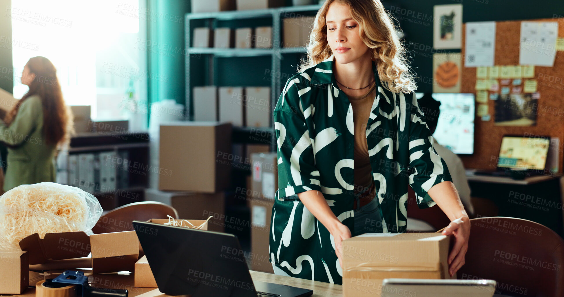 Buy stock photo Boxes, laptop and logistics with woman in office for delivery or shipping schedule. Computer, online order and supply chain with serious courier person in depot or warehouse for ecommerce tracking