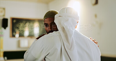 Buy stock photo Muslim, faith and people in mosque, hug and worship for Islamic religion, Ramadan and holy spirit. Fajr, praise and men with respect for Allah, embrace and gratitude to God in temple or belief