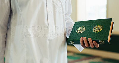 Buy stock photo Islamic person, hands and Quran in mosque for education, studying and spiritual worship to praise Allah. Muslim, faith or Imam with holy book for guidance, learning scripture and prayer in temple