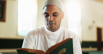Buy stock photo Islamic, man and Quran in mosque for reading, studying and spiritual help for worship or praise Allah. Muslim, faith or person with holy book for guidance, learning scripture and prayer in temple
