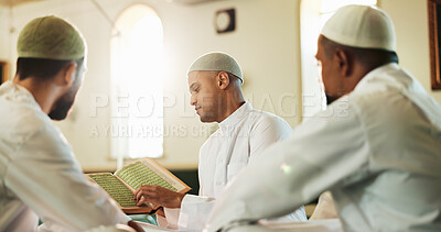 Buy stock photo Islamic, men and Quran in mosque for learning, reading and mindfulness with worship to praise Allah. Muslim people, teacher and religion with book for guidance, teaching scripture or prayer in temple