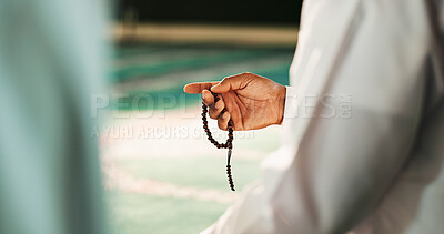 Buy stock photo Muslim, hands and person with prayer beads in mosque, worship and remember of Allah with Quran recitation. Closeup, islamic man and praise with tasbih for faith, gratitude and spiritual in religion