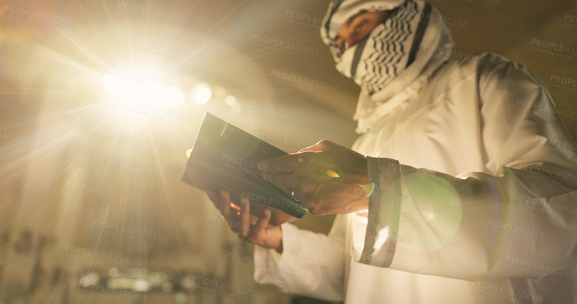 Buy stock photo Muslim man, Quran or praying in mosque to worship for faith, below or reading to Allah in Palestine. Light, Islamic religion or learning book for spiritual guidance, dua blessing or Ramadan Kareem