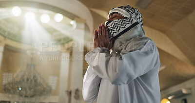 Buy stock photo Muslim person, faith or praying in mosque to worship for Palestine, help or gratitude to Allah in holy temple. Dua, Islamic religion or asking God for spiritual guidance, low angle or Ramadan Kareem