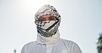 Portrait, Muslim and man with scarf, outdoor and covering face with keffiyeh, religion and worship. Islamic faith, spiritual and person with thobe for prayer, belief and respect for Allah or holy