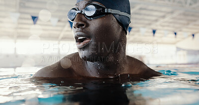 Buy stock photo Swimming, workout and man in pool, water and practice for competition, healthy or routine in morning. Swimmer, athlete and black person with goggles for performance, exercise or preparation for sport