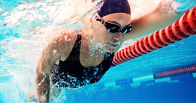 Buy stock photo Swimming, training and athlete in pool, water and practice for competition, healthy and workout in morning. Sports, active and person with energy for performance, exercise and swimmer with routine