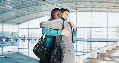 Buy stock photo Hug, swimming pool and men with fitness, training and greeting with support, goals and hello. People, athlete or friends in wellness center, embrace or teamwork with partnership, motivation or sports