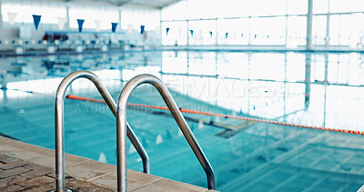 Buy stock photo Swimming pool, handrail and sports facility with safety, event and wellness center for community. Empty, balance and water with bars for secure grip, accessibility and enter with exit or mobility