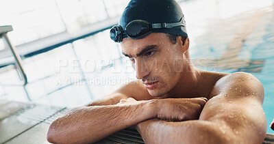 Buy stock photo Swimming pool, sports and man in water thinking for workout, training and exercise for race event. Fitness, reflection and person in gym for practice, challenge and determination for competition