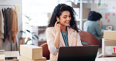 Buy stock photo Laptop, video call and woman with tech in office for ecommerce, courier or confirmation. Computer, earphones and female designer with live streaming for sale promotion with cardboard parcel.