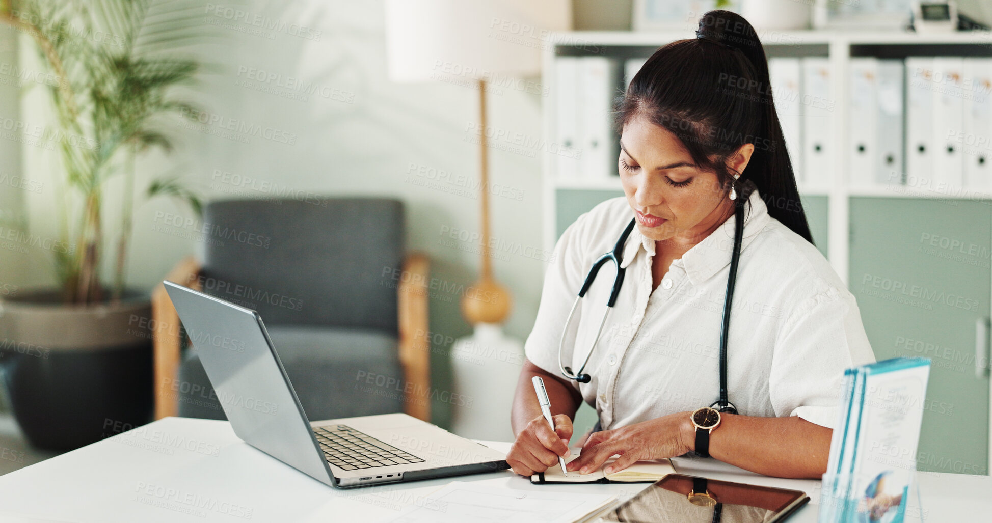 Buy stock photo Hospital, woman and doctor with writing for notes, medical diagnosis or information for research. Laptop, healthcare or female cardiologist with book for reminder, prescription or treatment in office