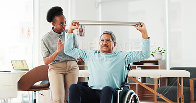 Buy stock photo Resistance band, physical therapy and person with a disability in clinic with muscle recovery. Consultation, wheelchair and woman physiotherapist for helping senior man with arm stretching exercise
