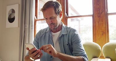 Buy stock photo Home, typing and man with smartphone, internet and connection with social media. Apartment, mobile user and person in lounge, cellphone and digital app for website info, communication and chatting