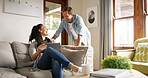 Laughing, couple and woman with card, tablet and browsing for online shopping in living room and discount. Home, customer and people with tech for digital purchase, happy and credit for ecommerce