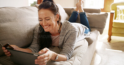 Buy stock photo Tablet, credit card and woman on sofa for payment, online shopping and internet banking. Debit, relax and happy person in home for discount purchase, sales and financial transaction for ecommerce
