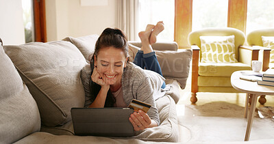 Buy stock photo Online shopping, credit card and woman on tablet in home for payment or internet banking. Debit, relax and happy person on sofa for purchase decision, choice and thinking of financial transaction