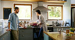 Couple, cooking and food in kitchen at house with organic ingredients, meal preparation and healthy lunch. Man, woman and nutrition salad with vegetables, vegan diet and bonding with partner support
