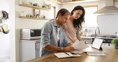 Buy stock photo Home, finance and couple with documents, payment for mortgage and rent. Apartment, transactions and man with woman in kitchen, investment growth or paperwork report for savings or planning for budget