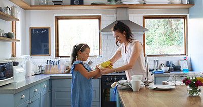 Buy stock photo Mother, helping and child with gloves in kitchen for spring cleaning, hygiene or chores together. Care, bonding and mom teaching girl kid safety for bacteria, dust or dirt for washing dishes in home.