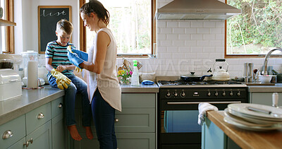 Buy stock photo Home, cleaning and mother with boy, help or learning with chores, washing dishes or healthy hygiene. Parent, mom or son in kitchen, child development or conversation with housekeeping or remove dirt