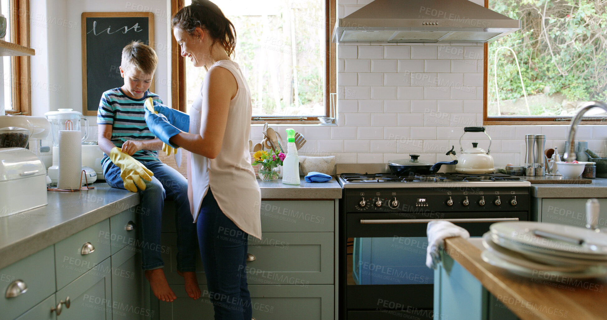 Buy stock photo Home, cleaning and mother with boy, help or learning with chores, washing dishes or healthy hygiene. Parent, mom or son in kitchen, child development or conversation with housekeeping or remove dirt
