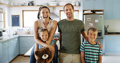 Buy stock photo Portrait, parents and kids laugh in kitchen for funny joke, playful family and bonding together. Smile, woman and man embrace children with love, support and care with teddy bear for weekend at house