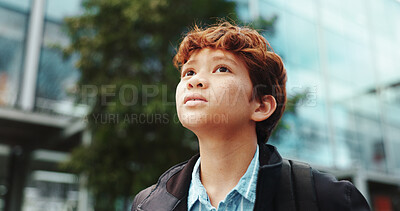 Buy stock photo Outdoor, walking and student with backpack for school, education and studying opportunity with thinking. Campus, male child and boy with thoughts for elementary, learning academy and learner outside