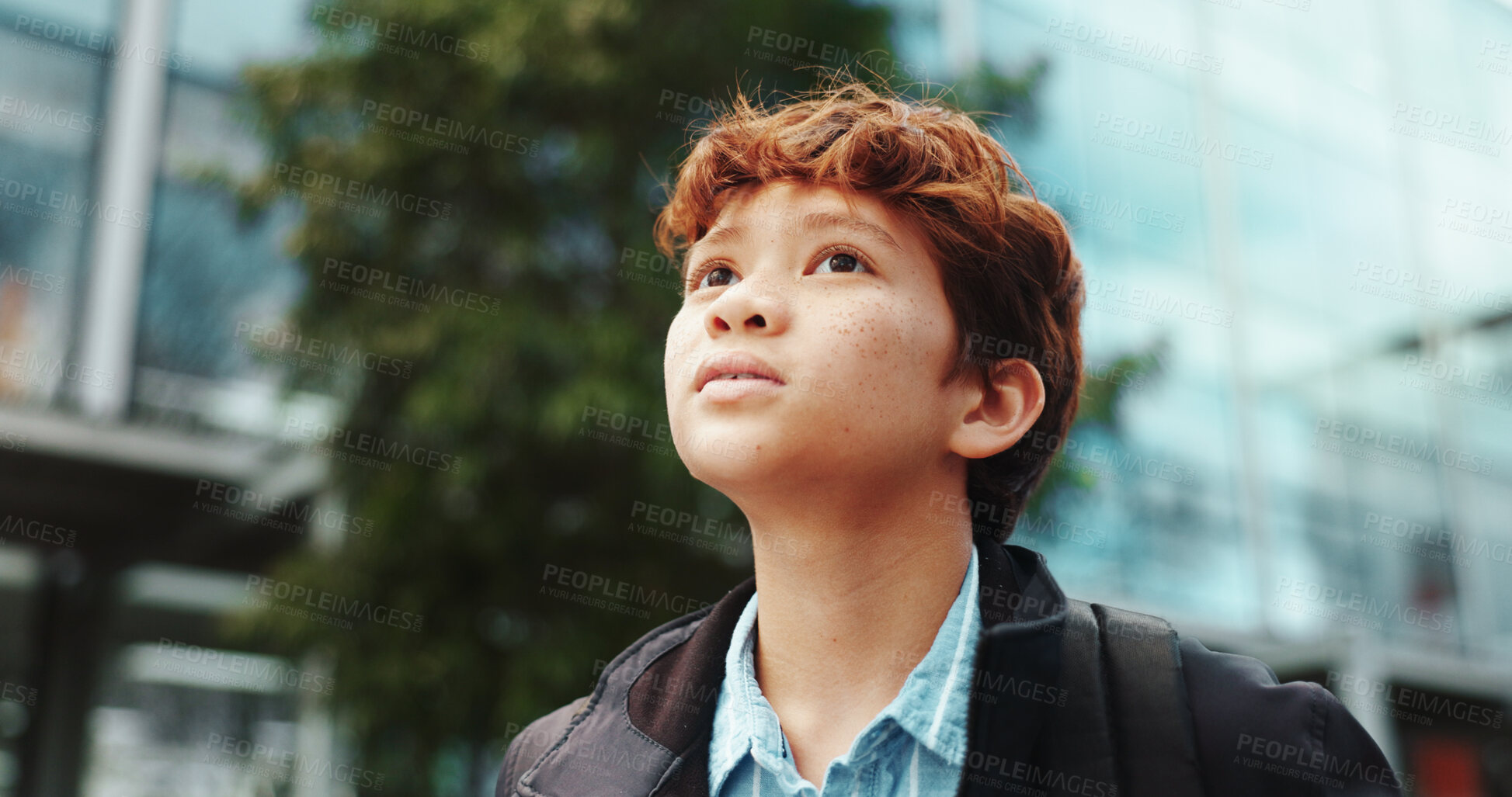 Buy stock photo Outdoor, walking and student with backpack for school, education and studying opportunity with thinking. Campus, male child and boy with thoughts for elementary, learning academy and learner outside