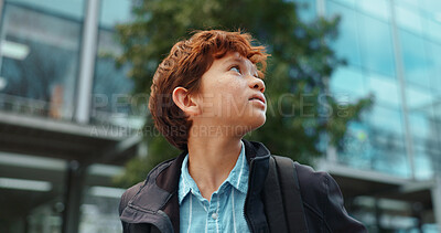 Buy stock photo Outdoor, boy and student with backpack for school, education and studying opportunity with thinking. Campus, male child and walking with thoughts for elementary, learning academy and learner outside