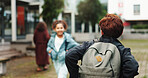 Back, student and walking with backpack outdoor for school, education journey and ready to learn. Academy, boy teenager and scholarship for academic development, knowledge study and growth on campus