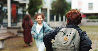 Buy stock photo Back, student and walking with backpack outdoor for school, education journey and ready to learn. Academy, boy teenager and scholarship for academic development, knowledge study and growth on campus