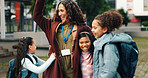 School kids, hug and smile with teacher. outdoor and reunion in city for solidarity, connection and playful. Children, group and woman with embrace, education and welcome for scholarship at academy