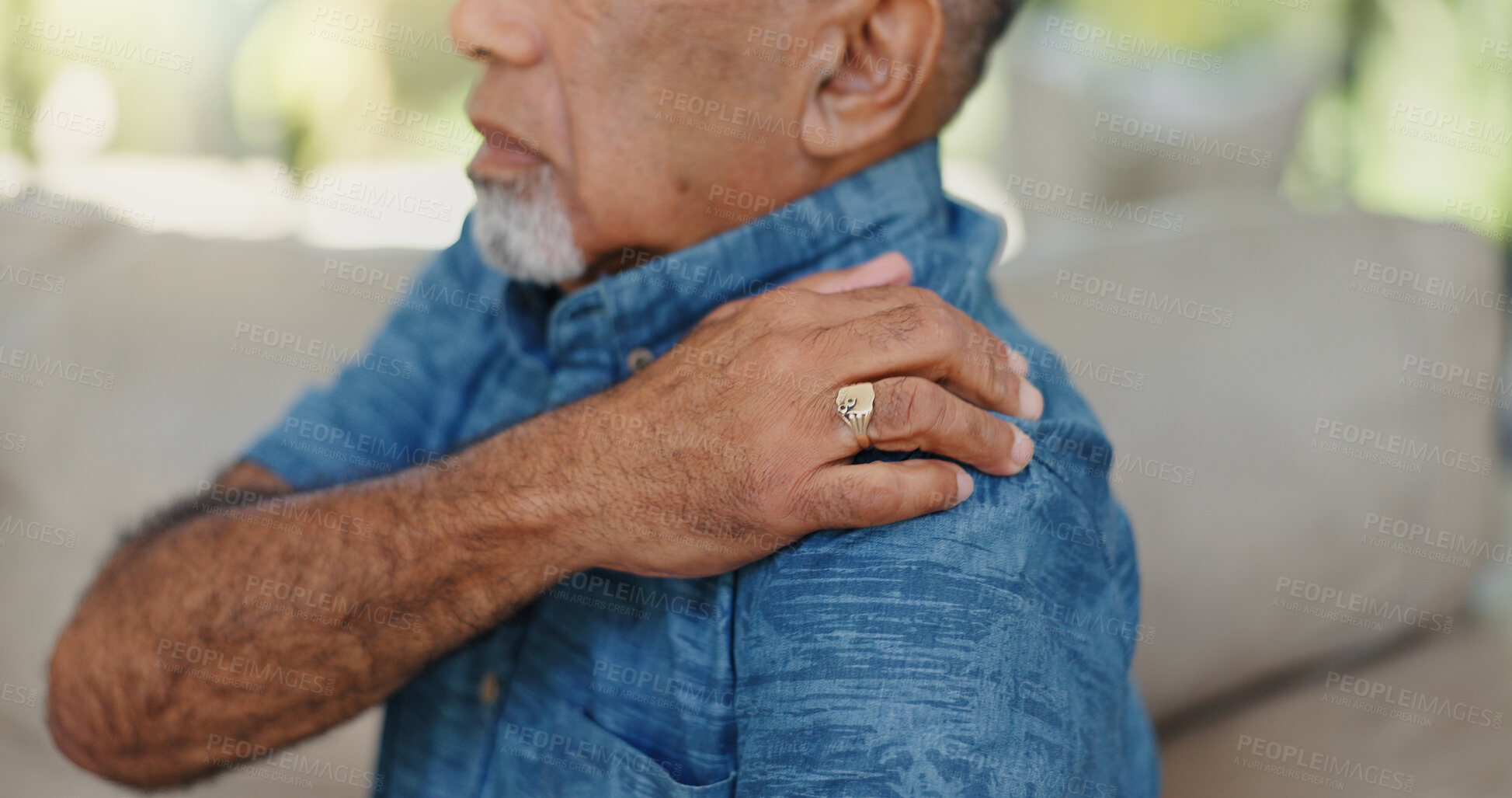Buy stock photo Senior, man and hands on shoulder pain in home with muscle tension, arthritis and discomfort. Elderly person, arm injury and joint ache on sofa with tendinitis, nerve damage and strain in retirement